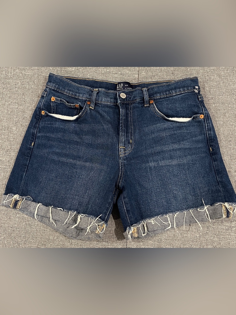 Gap dark indigo denim shorts with raw hem size 8/29 5" length